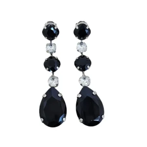 Elevate your style with the Astor Black Crystal Earrings. Handcrafted with cascading black and clear crystals, these 8cm teardrop earrings radiate elegance and individuality