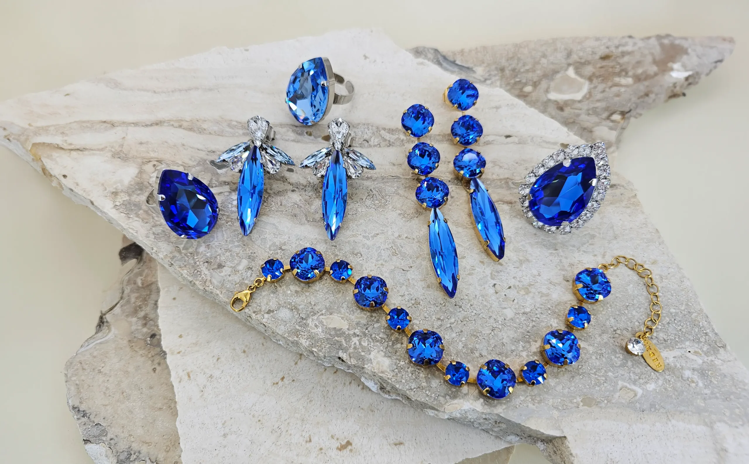 The Blue Edit Jewellery Collection Banner Exquisite blue jewellery, gorgeous blue earrings, blue rings, blue bracelets. Delight in sparkling jewellery.